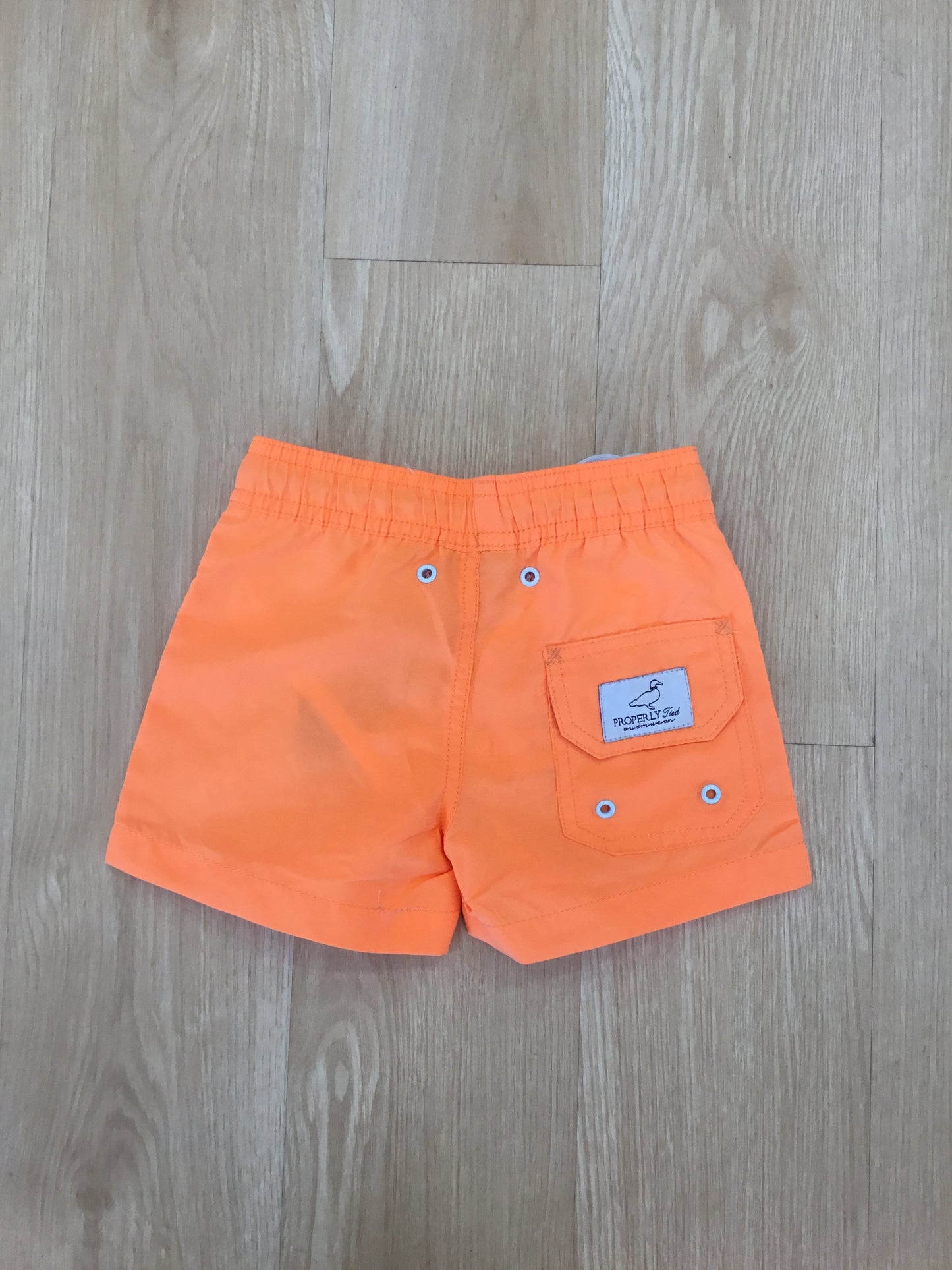 ORANGE SWIM TRUNKS